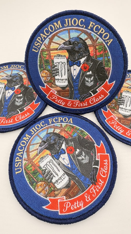 Custom twill patch with embroidered detail and finished merrowed edge