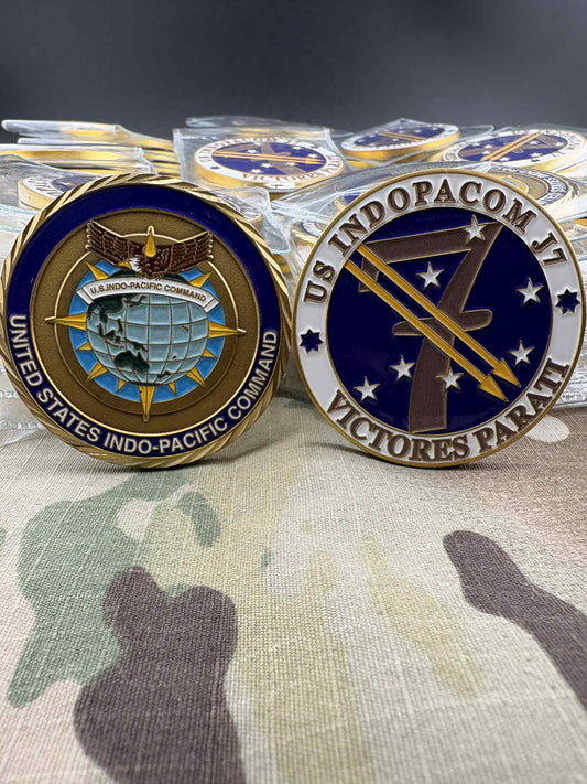 Custom challenge coin with enamel colour fill and metal relief